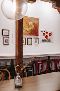 bright modern interior with contemporary art pieces and wooden furniture creating a cozy atmosphere. 5825423 200x300 1 – Kitchen and Dining Décor: Designing Functional and Beautiful Everyday Spaces